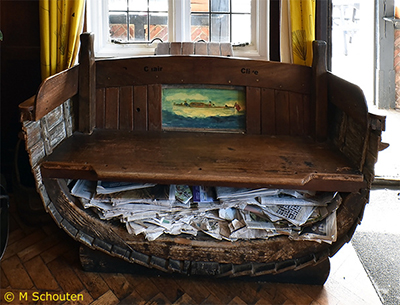 Seat made from stern of rowing boat with small internal painting.  by Michael Schouten. Published on 20-02-2020